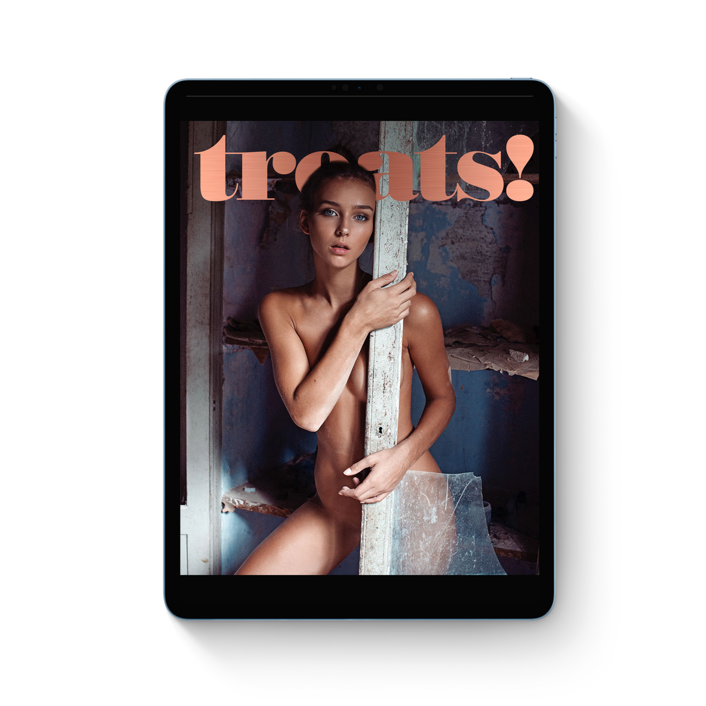 Magazine cover with a woman holding a mirror, featuring the brand 'treats!'.