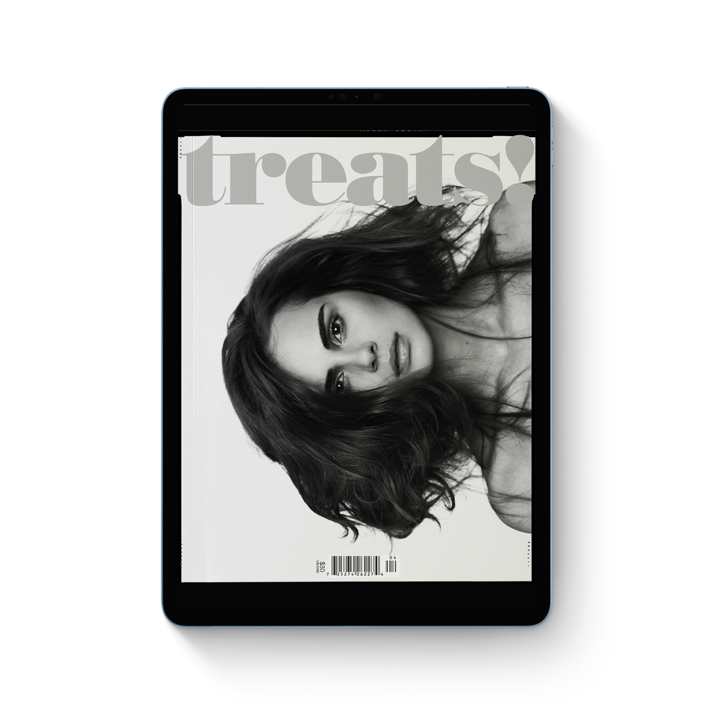 Digital magazine cover displayed on a tablet with 'treats!' branding.